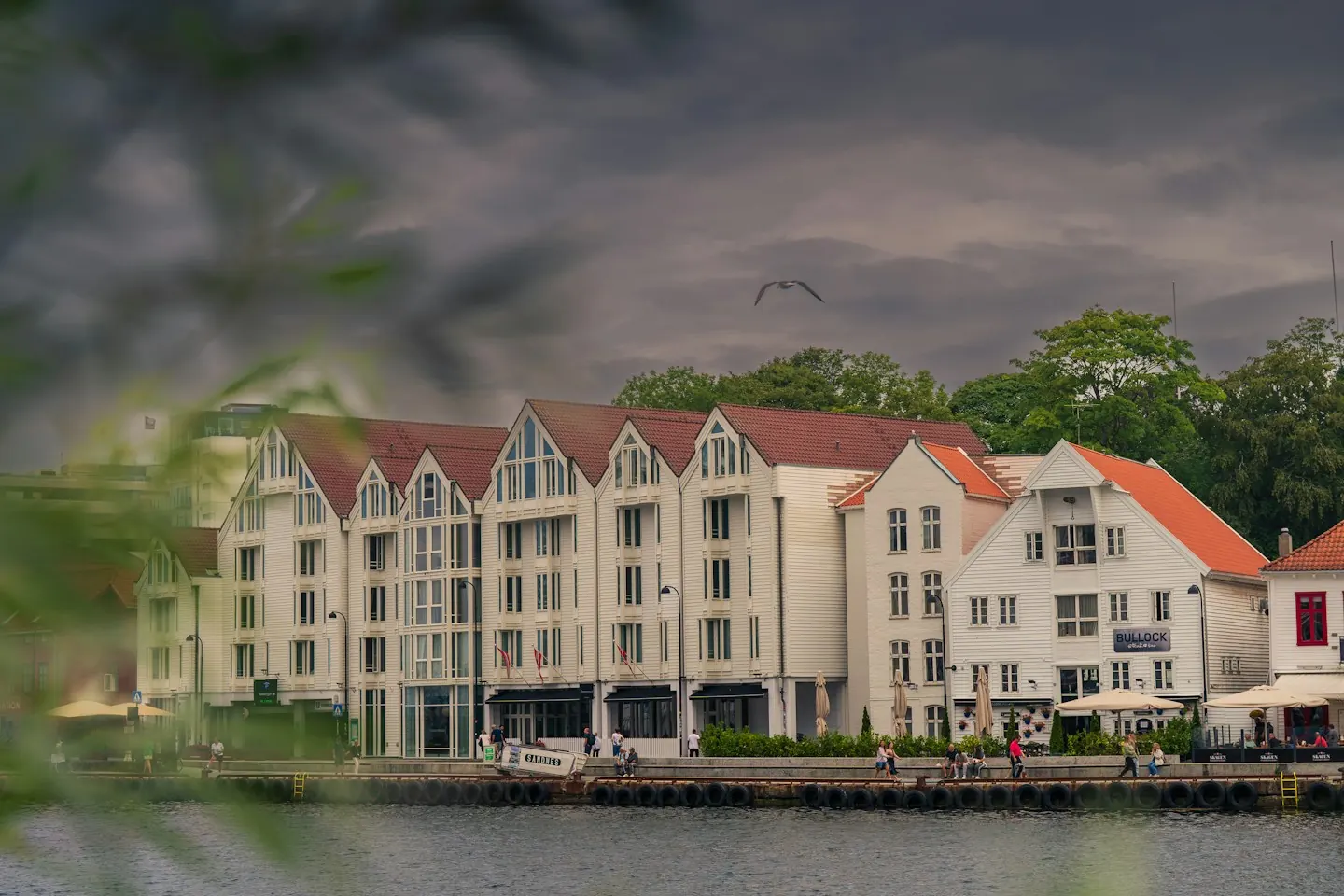Waterfront buildings beneath an open sky