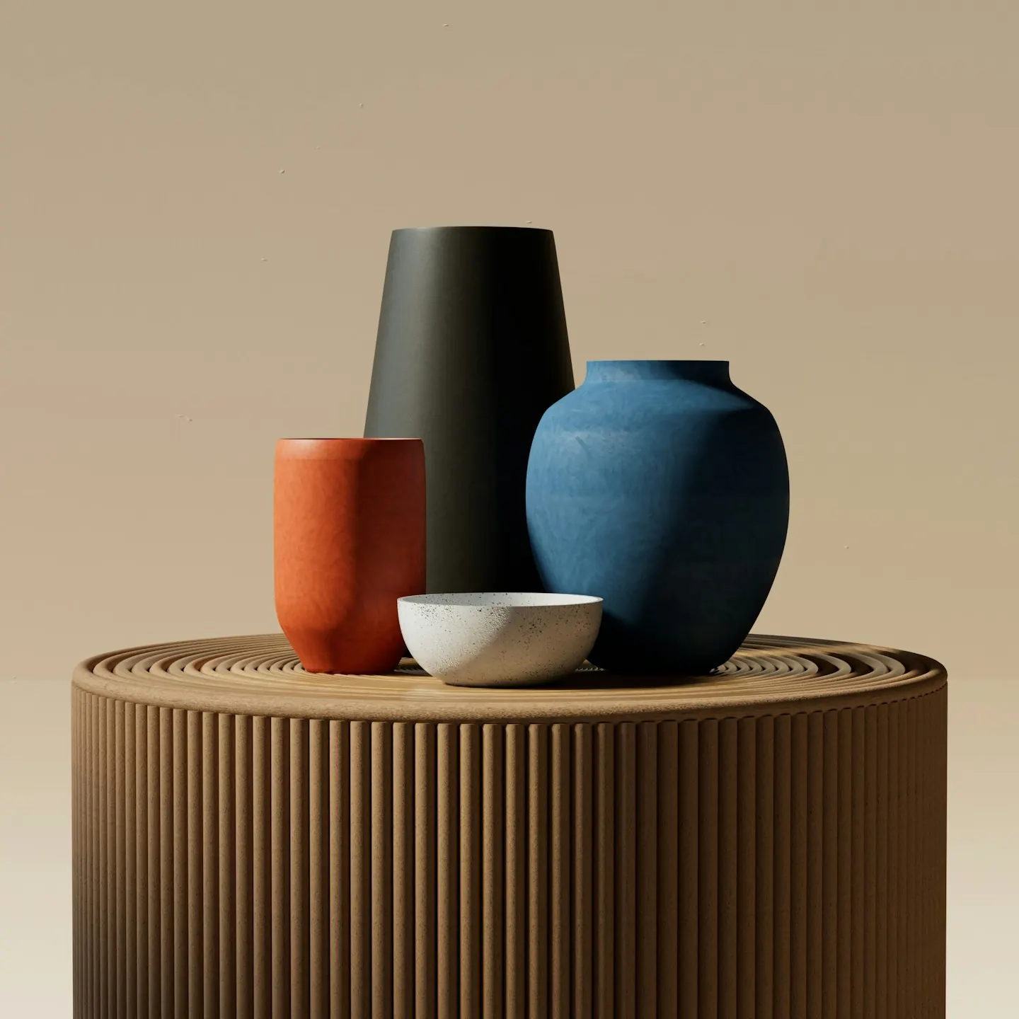 Ceramic bowls and vases on a ribbed wooden table