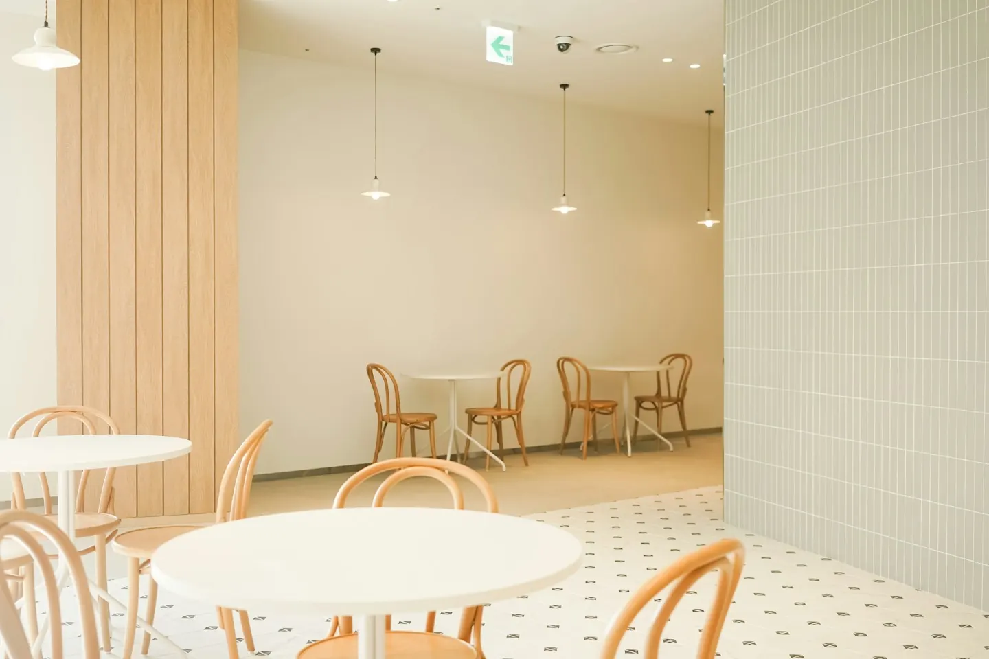 Warm dining room with tables and chairs